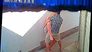 Amateur video shows couple having sex in front of restaurant.