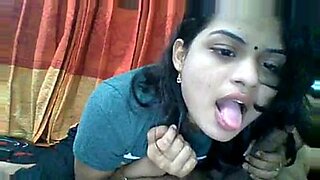 Hot Indian woman crying while giving a blowjob and jerking off a black cock.