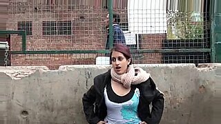 Redhead teen Zarina Massoud shows her tits and pussy in public, an Indian amateur.