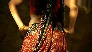 Pretty Indian brunette performs a slow and very sensual strip-tease.