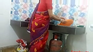 Bengali couple in bed red saree